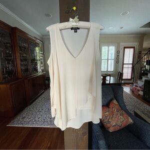 Sleeveless Karen Kane top with Curved deep V neck and front drape.